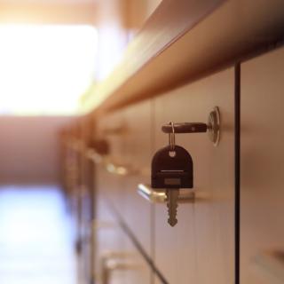 photo of filing cabinets with a key attached