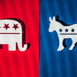 picture of republican elephant on red background vs democrat donkey on blue background