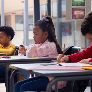 picture of 3 students of varying races/ethnicities